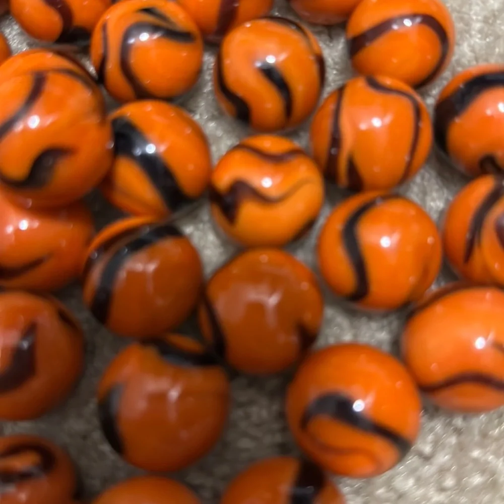 set of 5 bengal tiger mega glass marbles. Orange , black